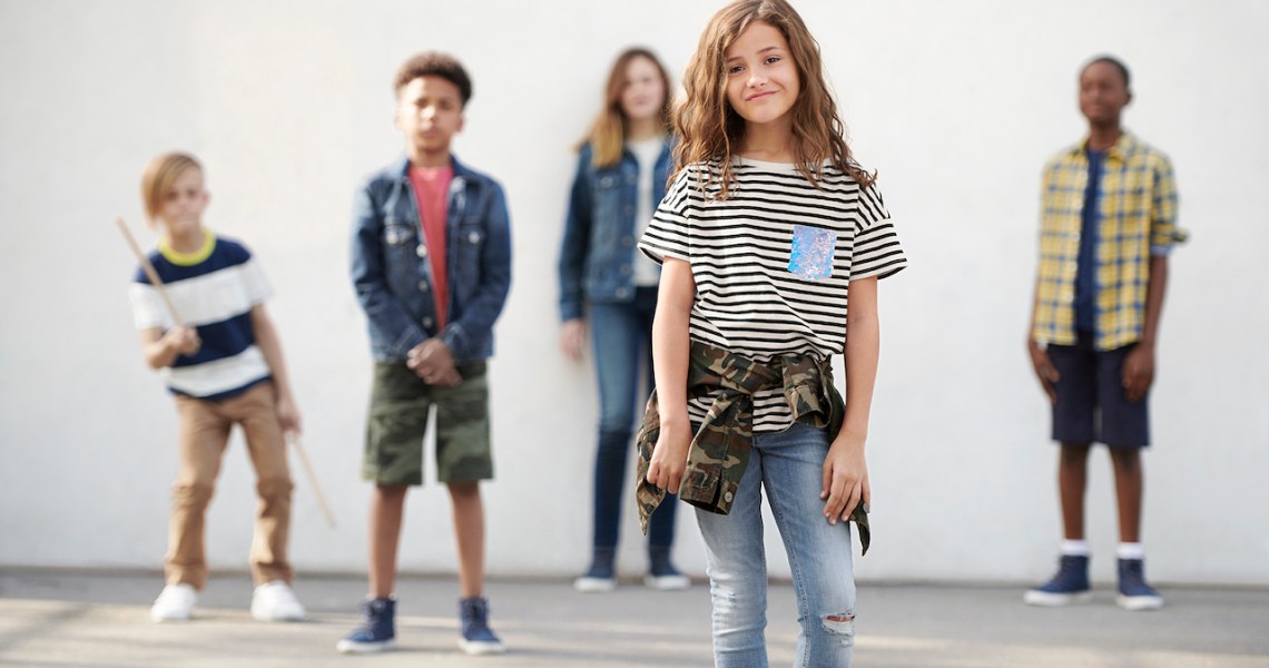 The header image shows a group of kids in back-to-school clothing.