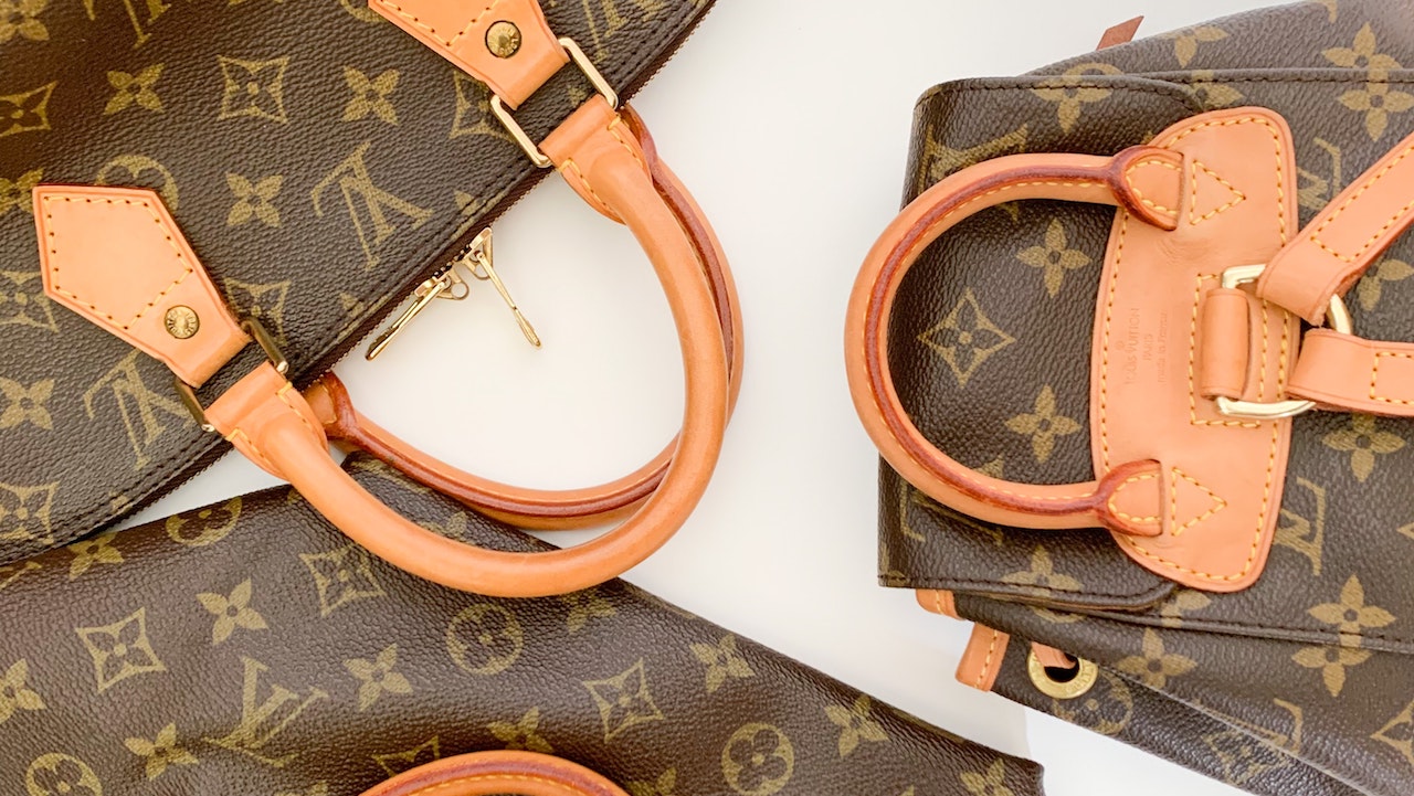 Status Update: Fashionphile, reseller of discounted luxury handbags, opens  at Irvine Spectrum – Orange County Register