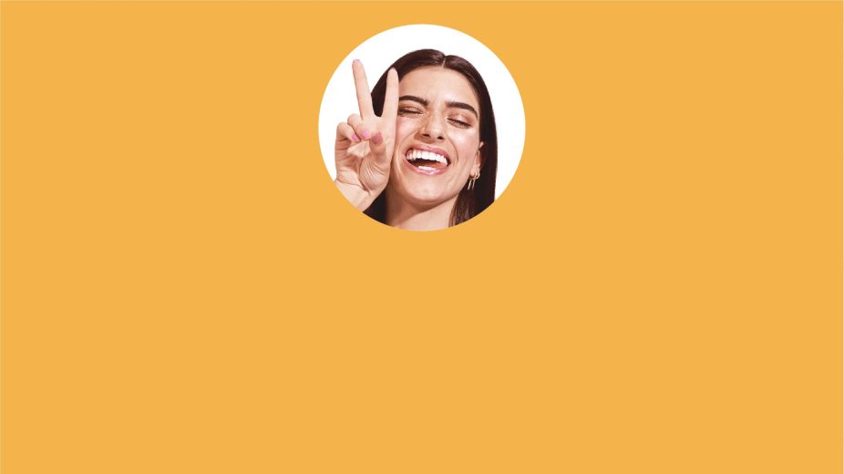 Dixie D'Amelio on yellow background