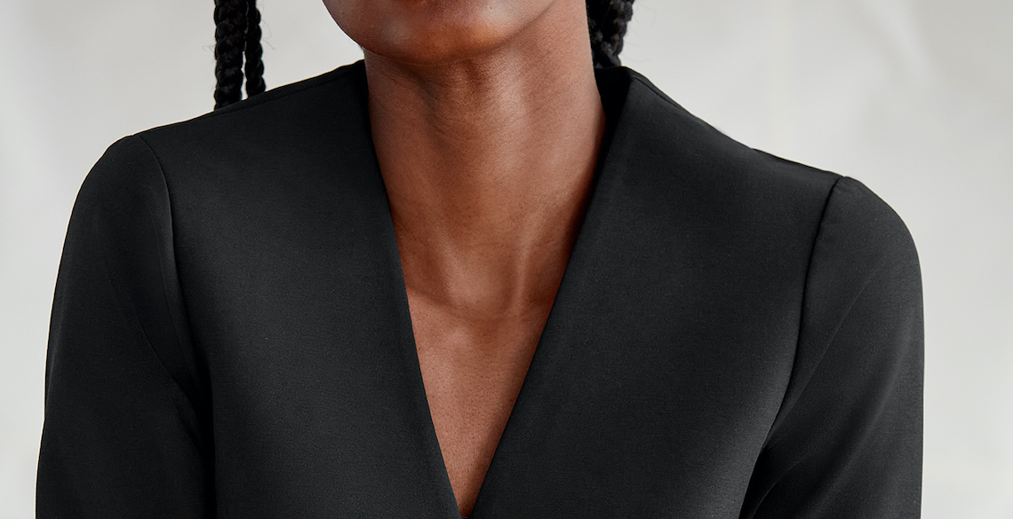 The header features a person's neckline.