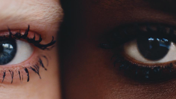 Photograph of two people's eyes side-by-side.