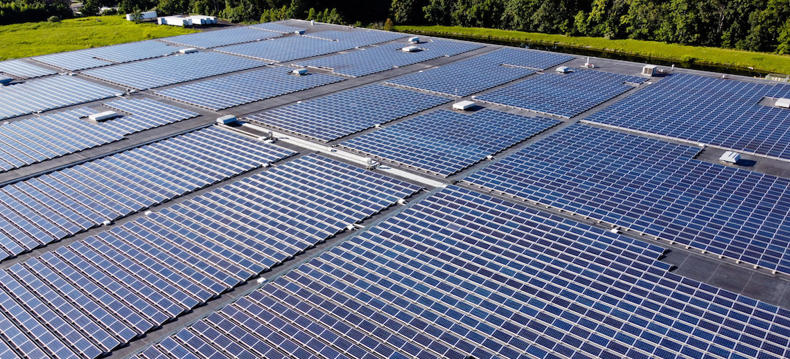 Photograph of solar panels on a roof.