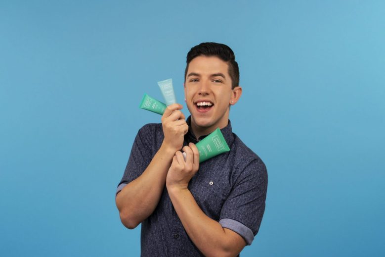 The lead image shows Hyram Yarbro holding skincare products.