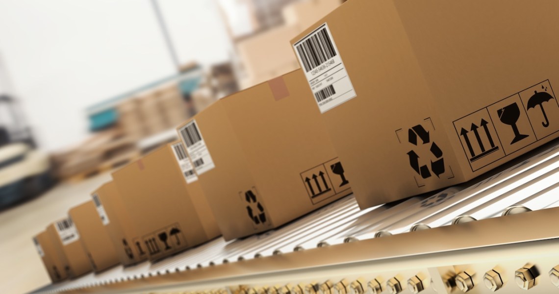 Photograph of boxes on a conveyor belt.
