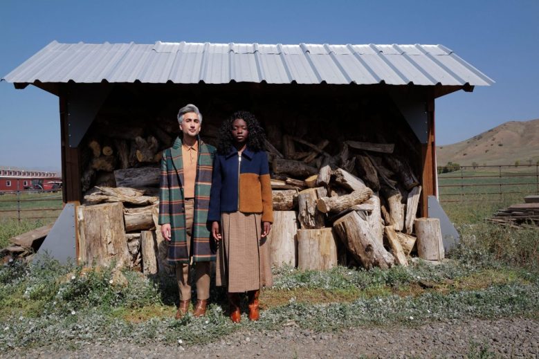 Image of Tan France outerwear on models in field