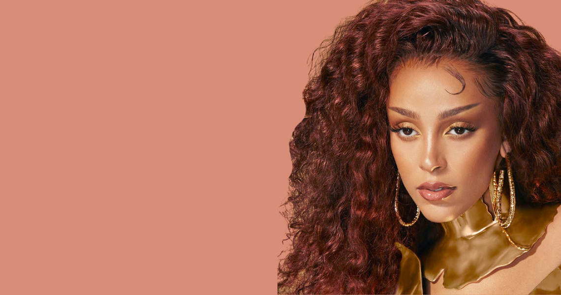Doja Cat with peach background