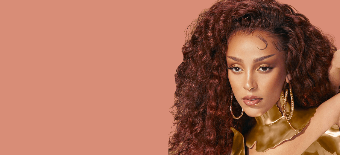 Doja Cat with peach background