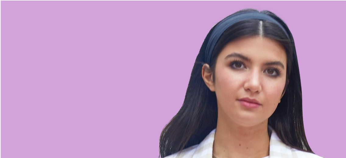 Ellie Zeiler featured in front of purple background