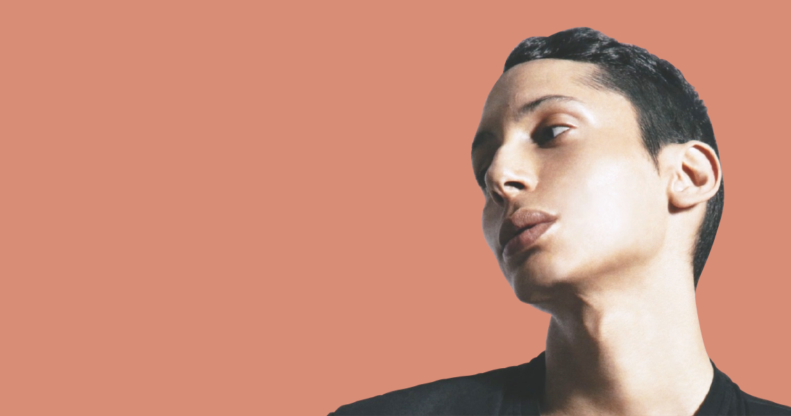 Charles Gross with peach background