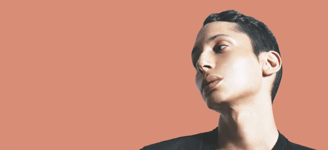 Charles Gross with peach background