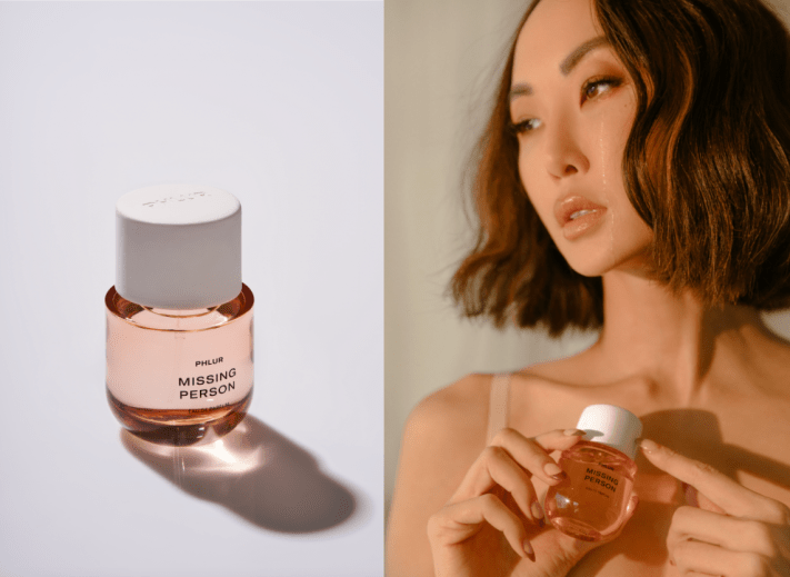 Chriselle Lim posing with Phlur perfume